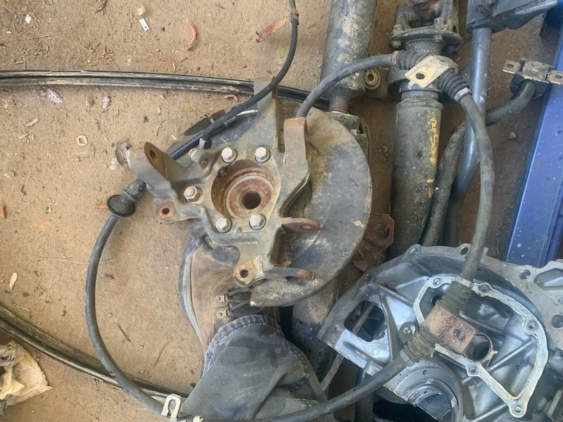 03-06 Lancer Evolution Evo 8 9 LH REAR SPINDLE HUB ASSEMBLY W/ EBRAKE CABLE