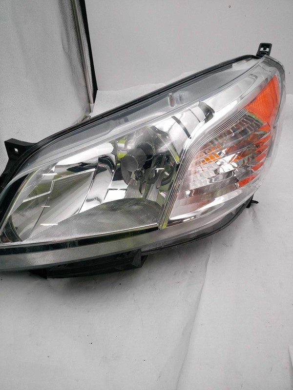 2021 Nissan NV200 Left Headlight Assembly White - Deep Scratches, 75k Miles