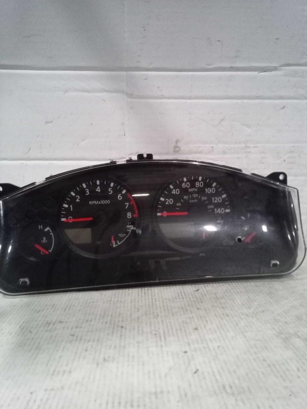 2009 Nissan Frontier Speedometer Gauge OEM Silver 24810ZL72B 141K Miles