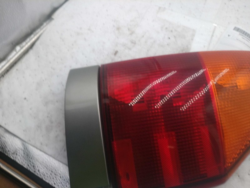 2003 GMC Envoy Left Tail Light Assembly Gold 31012 Used 127K Miles