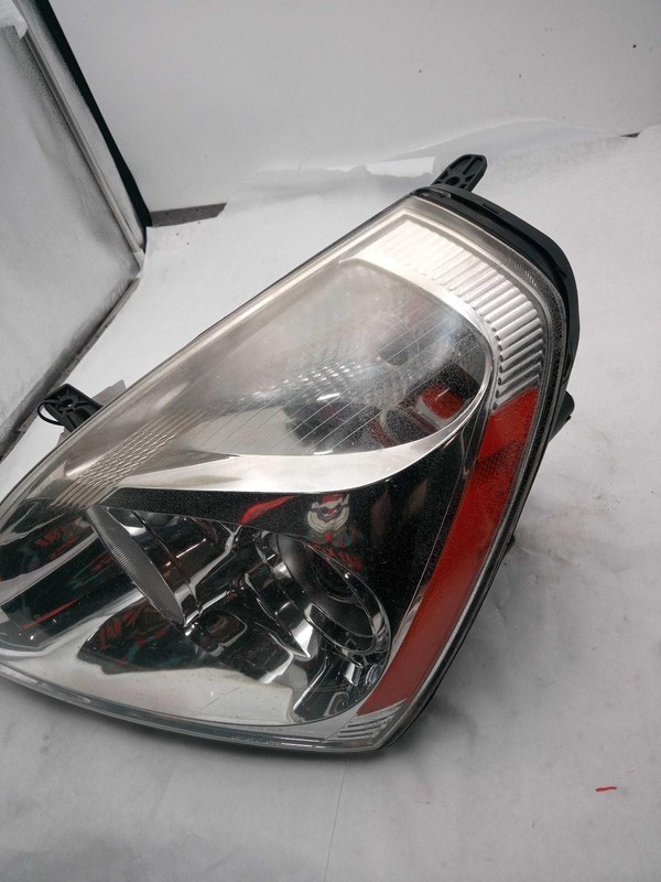 2014 KIA Sedona Left Headlight Assembly Grey Used w/ Stress Cracks 619861