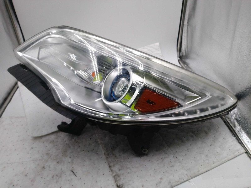 2015 Buick Enclave Left Headlight Assembly Silver Used Minor Scuff Marks
