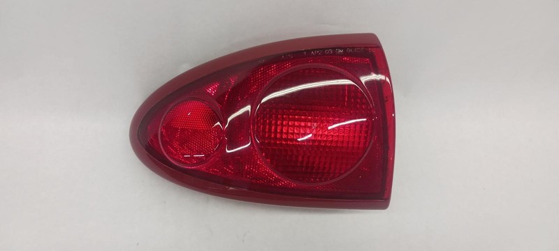 03-'05 CHEVROLET CAVALIER Left driver Taillight quarter mounted OEM