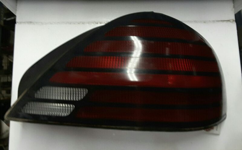 99 00 01 02 03 04 05 GRAND AM R. TAIL LIGHT QUARTER PANEL MOUNTED SE 82466