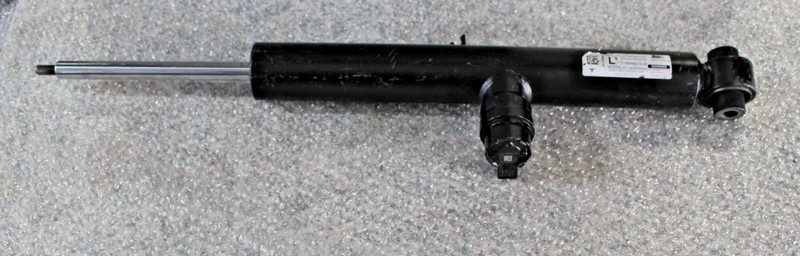 Genuine 2025 Tesla model Y 2188463-00-BRear Left Shock absorber Strut OEM