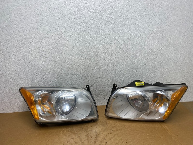 2007-2012 Dodge Caliber Left+Right Headlights Halogen TYC AE0582 DW