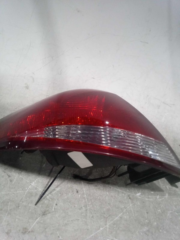 Used Left Tail Light Assembly fits: 2005 Ford Taurus Sdn quarter mounted w/o lam
