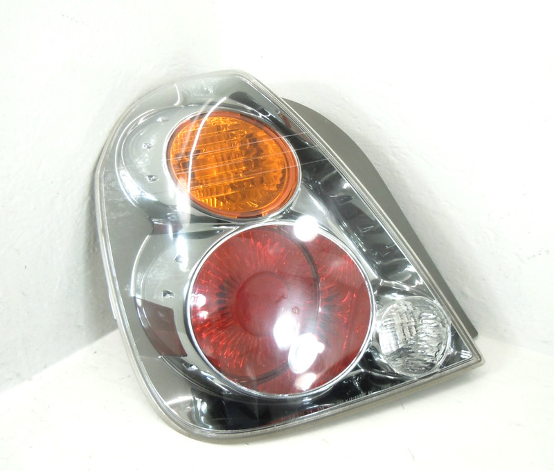2002-2004 Nissan Altima Quarter Panel Mounted Tail Light Driver Left OEM