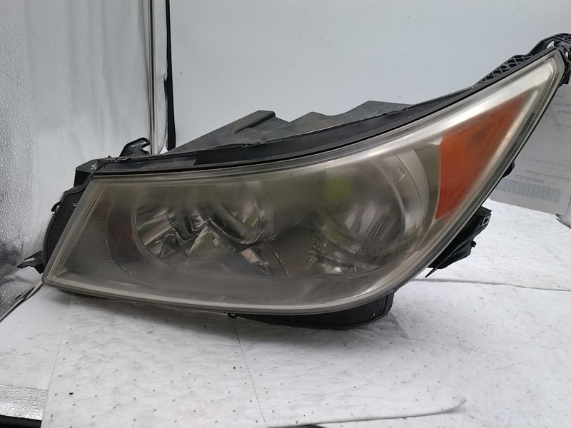 Used Left Headlight Assembly fits: 2013 Buick Lacrosse halogen opt T4A Left Grad