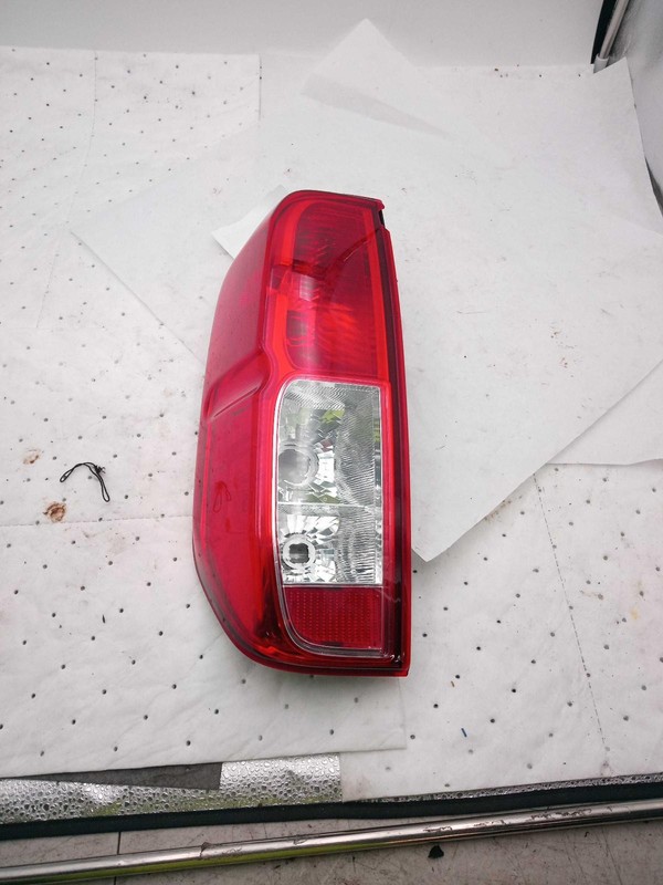 Used Left Tail Light Assembly fits: 2012 Nissan Frontier quarter panel mounted L