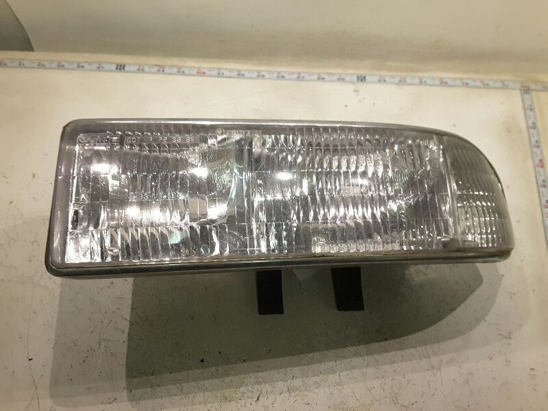 DRIVER HEADLIGHT CHEVROLET .5MM STEP ON BEZEL FITS BLAZER S10/JIMMY S15 161396