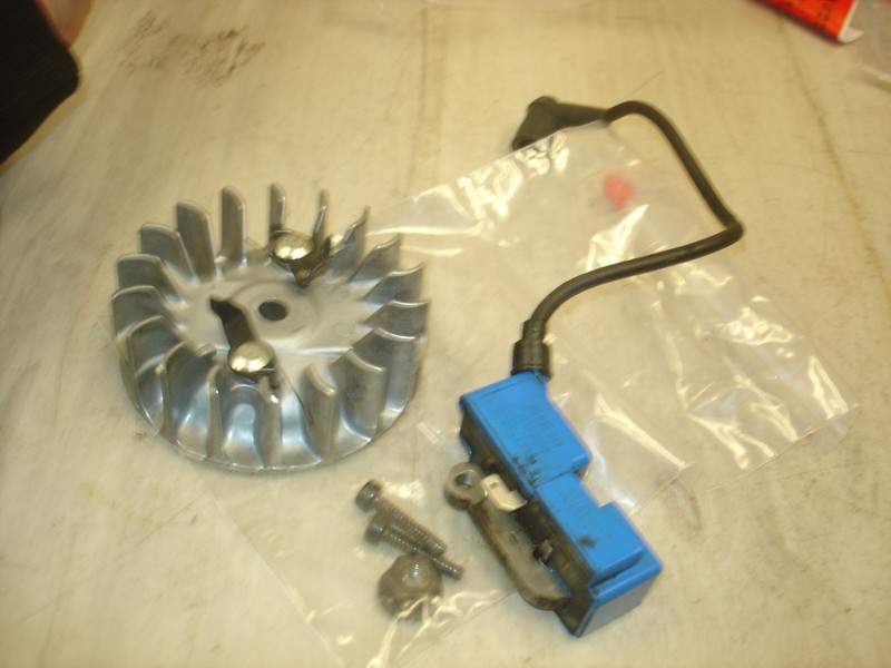 Jonsered cs 2150 coil and flywheelprimer chainsawpart only