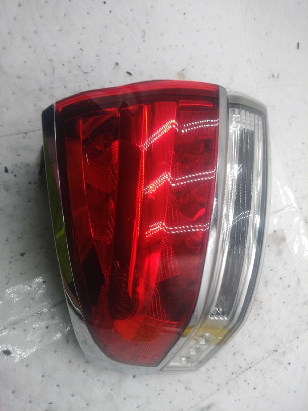 2012 Lincoln MKX Left Tail Light Assembly Red OEM Used - Spider Cracking