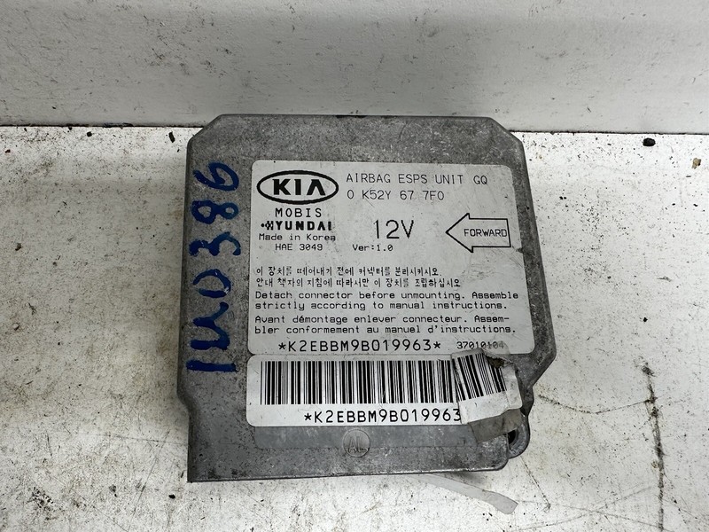 2002-2005 Kia Sedona US Market Occupant Module Computer ID: 0K52Y677F0