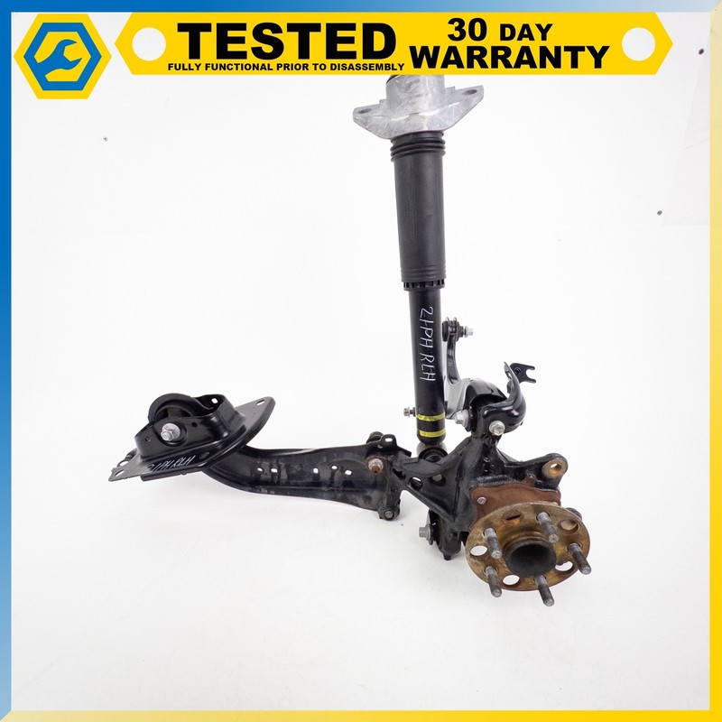 16-22 TOYOTA PRIUS REAR LEFT SUSPENSION ASSEMBLY KNUCKLE HUB SHOCK ABSORBER OEM