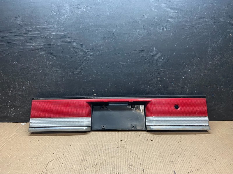 1989 - 1991 Plymouth Acclaim Center Tail Panel Finish Trunk License Plate i3599