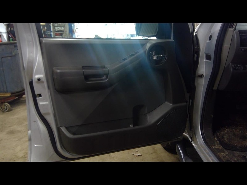 2009 XTERRA Driver Left Front Door Trim Panel 1624141