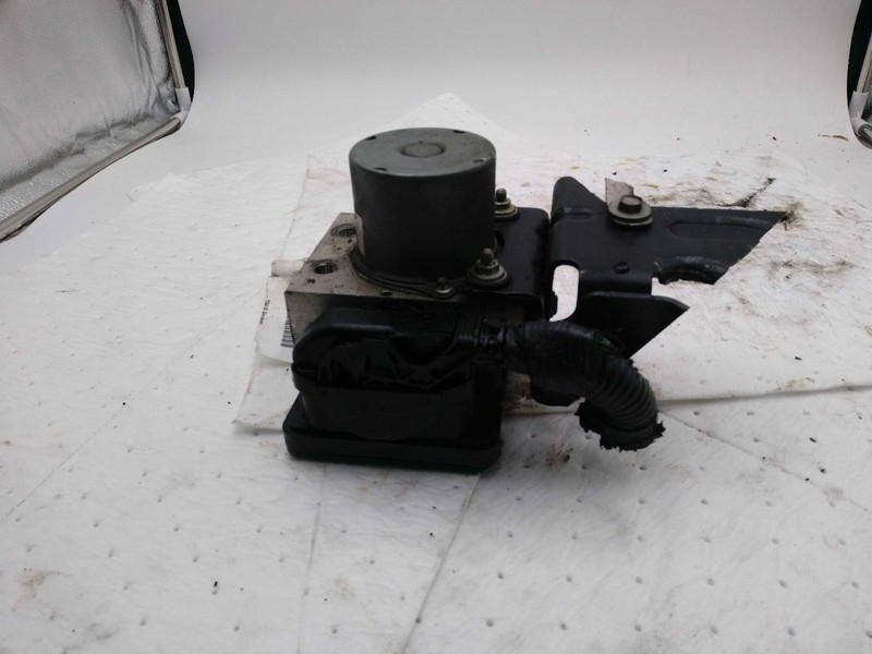 Used ABS Pump and Motor Assembly fits: 2016 Dodge CaravanGrade B