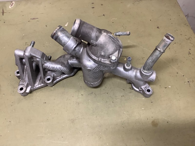 11-17 Engine water passage, thermostat housing Used OEM