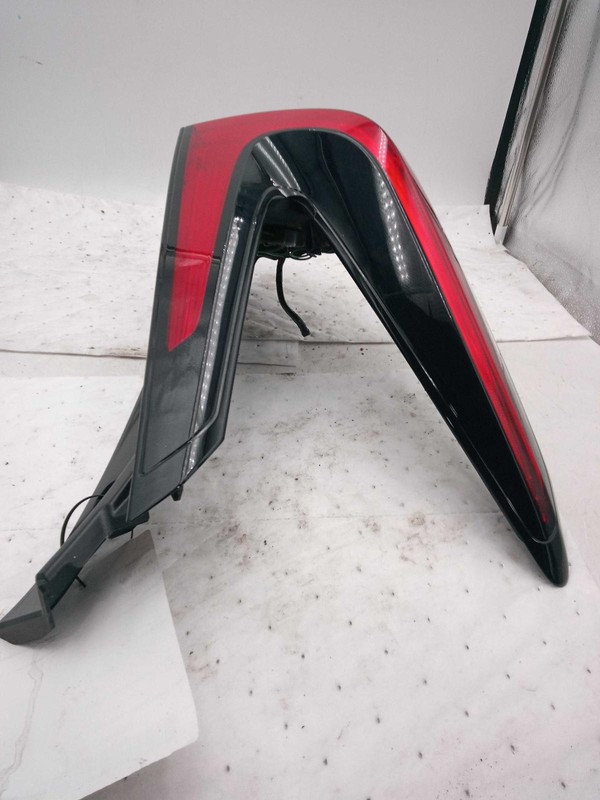 Used Left Tail Light Assembly fits: 2023 Nissan Leaf quarter mounted Left Grade
