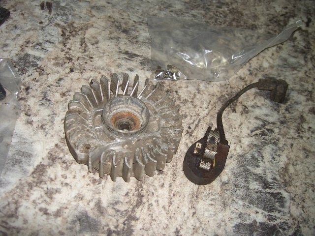 Stihl 044 coil and flywheel OEM chainsaw part onlybin482
