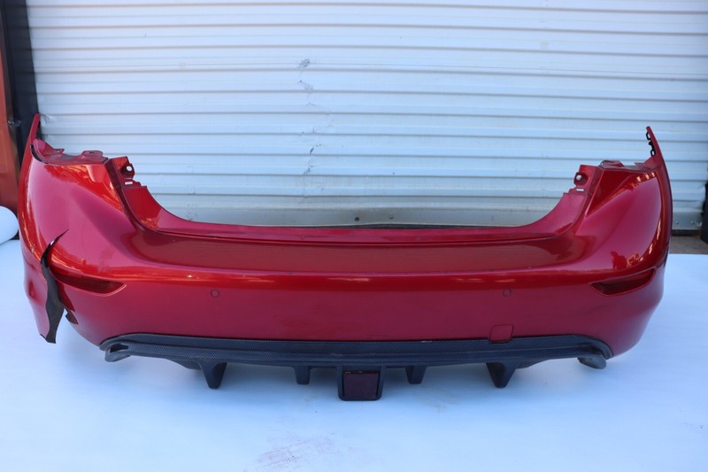 2014-2017 INFINITI Q50 REAR BUMPER COVER PANEL ASSEMBLY W/ PARK ASSIST OEM