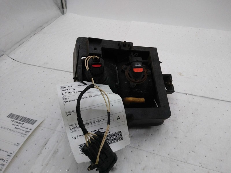 2007 Cadillac CTS Left Turn Signal/Parking Light Assembly - Black, Used