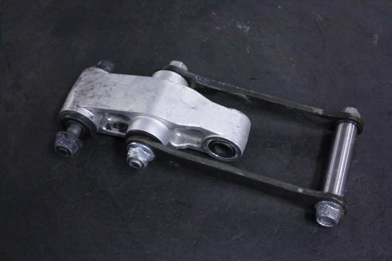 06 KAWASAKI EX 500 NINJA REAR SHOCK MOUNT DOG BONE LINK LINKAGE ARMS EX500