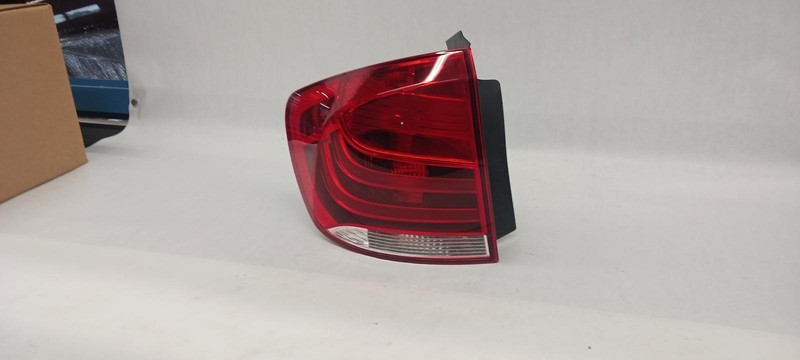 12-'15 BMW X1 Left driver Taillight quarter mounted OEM Guaranteed!
