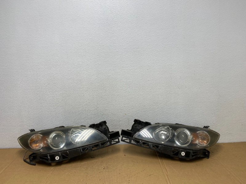 2004 to 2009 Mazda 3 Sedan Left+Right Side Headlights Oem AD0871 DW