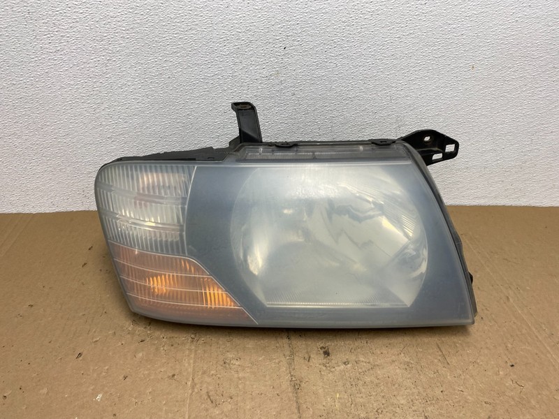 2000 to 2004 Mitsubishi Montero Pajero Right Passenger RH Headlight AC7249 DW