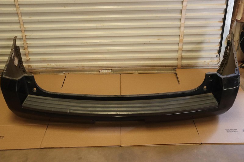 2015-2016 CHEVY/GMC SUBURBAN 1500 REAR BUMPER COVER W/ PDC SENSORS OEM
