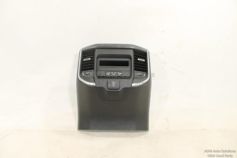 2019 - 2024 RAM 1500 CENTER CONSOLE REAR PANEL W/ CUP HOLDER/AIR VENTS BLACK OEM