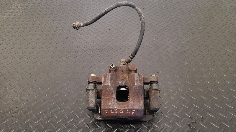 83-97 Nissan Pickup 2.4L 4x2 Front Left Driver Brake Caliper OEM 4101109W00