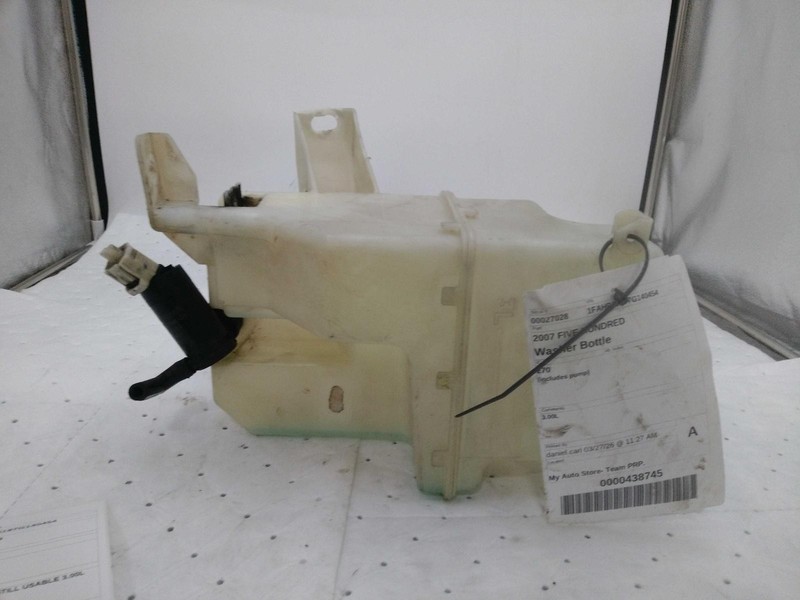 Used Washer Fluid Reservoir fits: 2007 Ford Five hundred includes pump Grade C