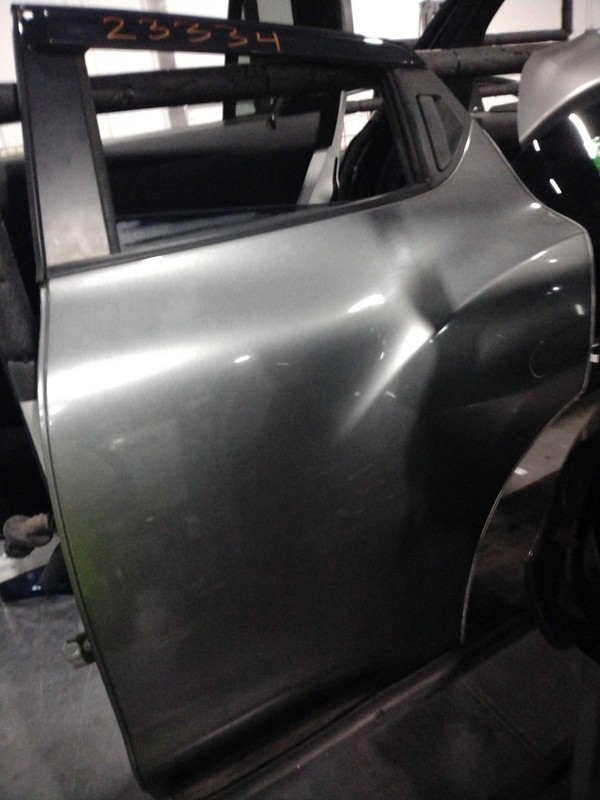 2012 Nissan Juke Left Rear Door Grey Small Dent 110K Miles OEM Replacement