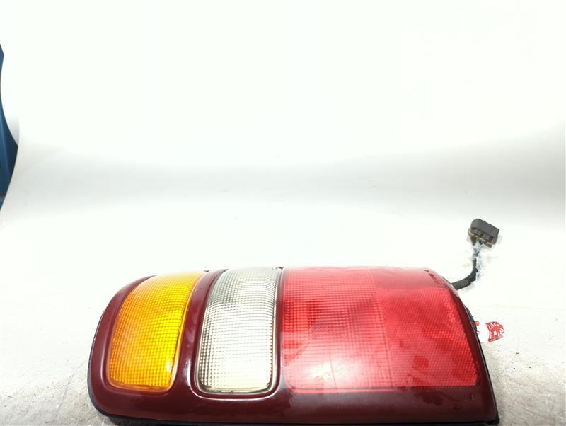 2003 Chevrolet Tahoe Left Tail Light Assembly Brown 597071 Used OEM Part