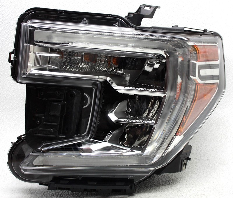 OEM Left LED Headlamp For GMC Sierra 1500 - Lens Scratches & 2 Tabs Missing