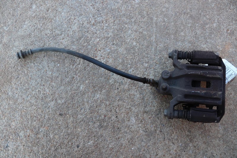 2006-2012 NISSAN PATHFINDER REAR RIGHT SIDE BRAKE CALIPER W/ HOSE OEM