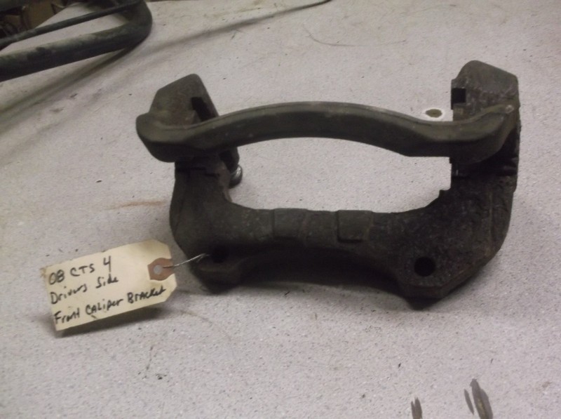 2008 Cadillac CTS 4 Drive'rs Side Front Caliper Bracket PE42T-WF5 7L06