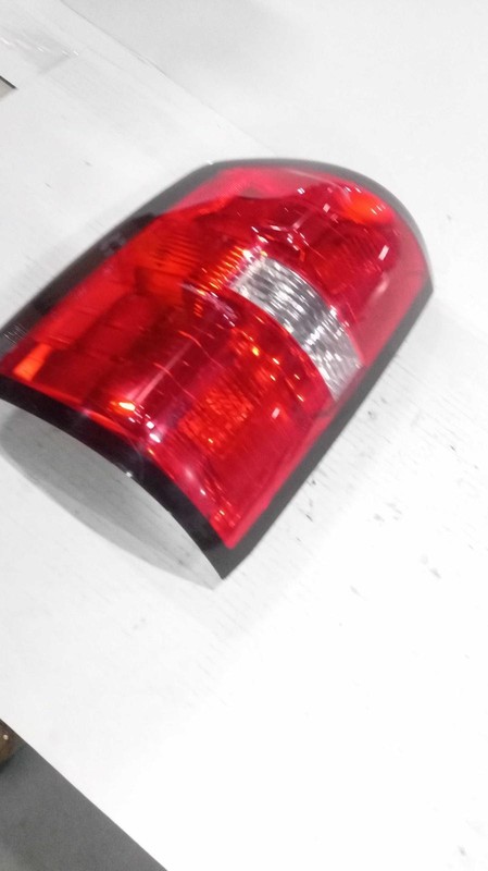 2016 GMC Sierra 1500 Left Tail Light Assembly Silver Used - Lite Scratches