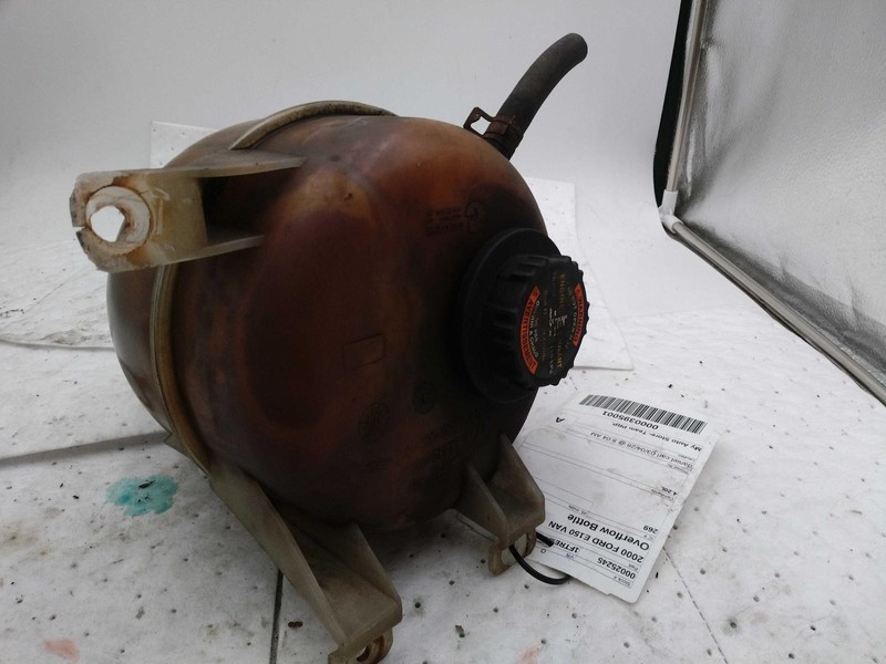 Used Engine Coolant Reservoir fits: 2000 Ford E150 VAN w/diesel round tank Grade