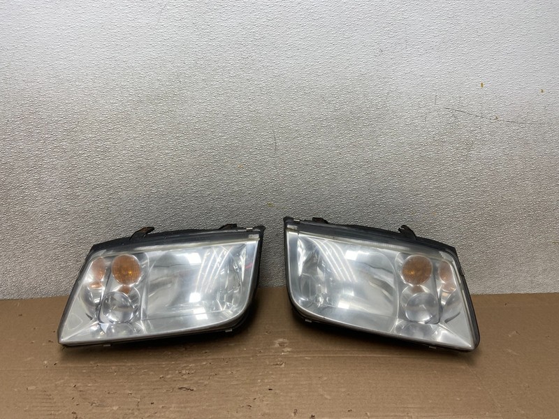 2002 to 2004 Volkswagen Jetta Left+Right Halogen Headlights AB1413 DW