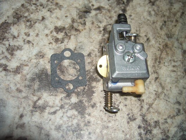 Stihl 025walbro wt 215 carburetor Rebuilt chainsaw part bin 702
