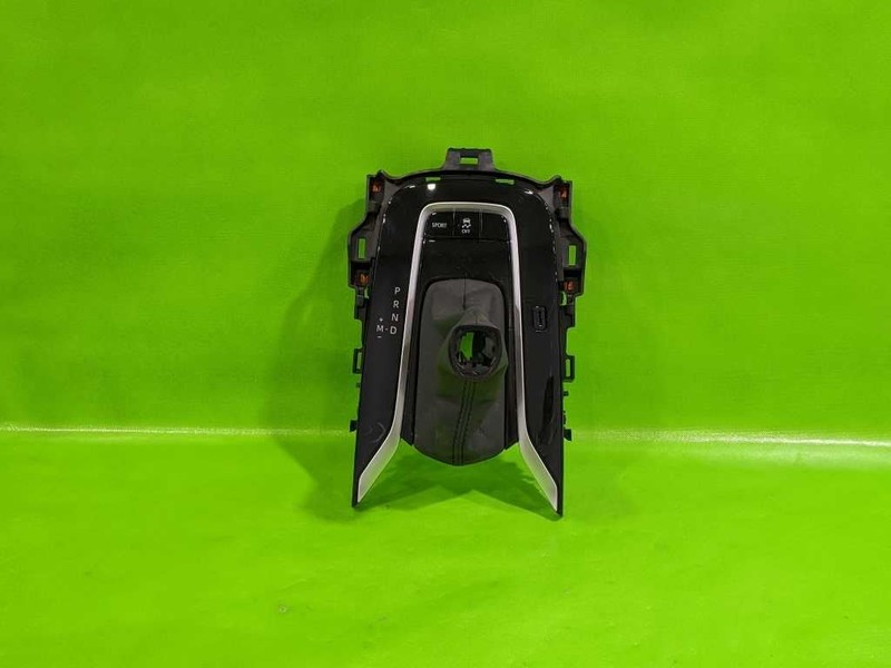19-25 COROLLA HTBK GEAR SHIFT SELECTOR BEZEL TRIM OEM 4284-43