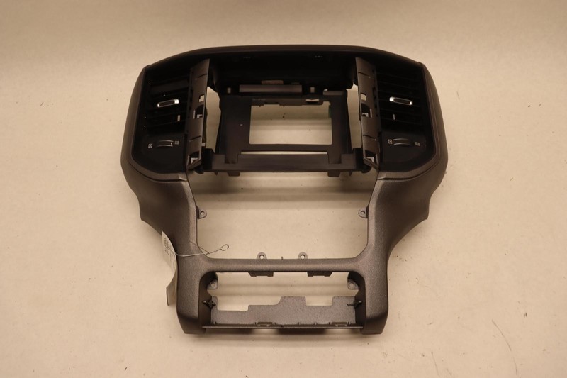 2019-2025 DODGE RAM 2500 DASHBOAR RADIO COVER TRIM BEZEL W/ AIR VENTS OEM