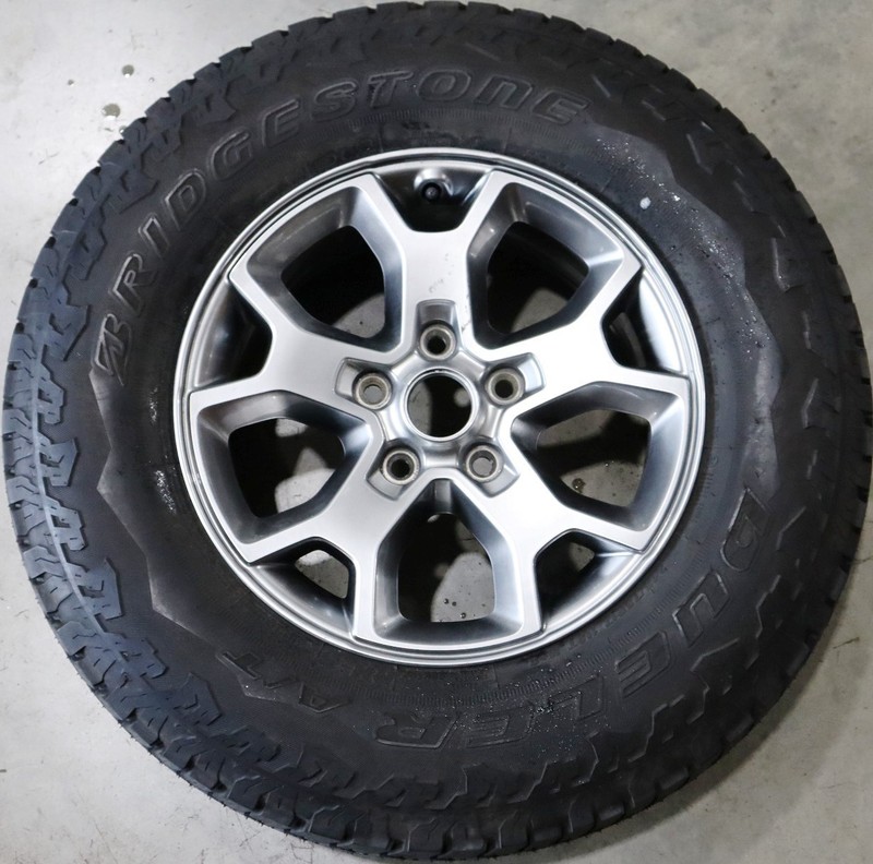 Carbon Grey Silver 17" Wrangler Wheel BRIDGESTONE DUELER A/T 245/75R17 Tire OEM
