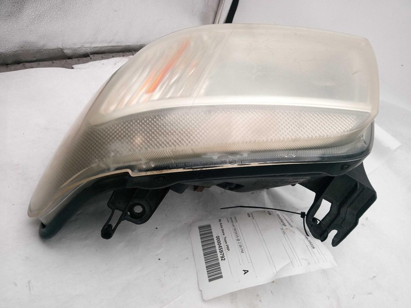 Used Left Headlight Assembly fits: 2008 Mercury Mariner Left Grade C