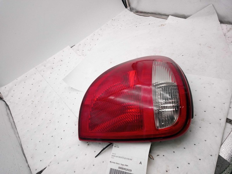 Used Left Tail Light Assembly fits: 2005 Dodge Caravan Left Grade B