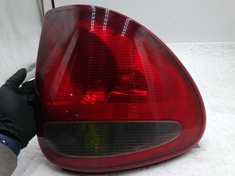 Used Left Tail Light Assembly fits: 2005 Dodge Caravan Left Grade A